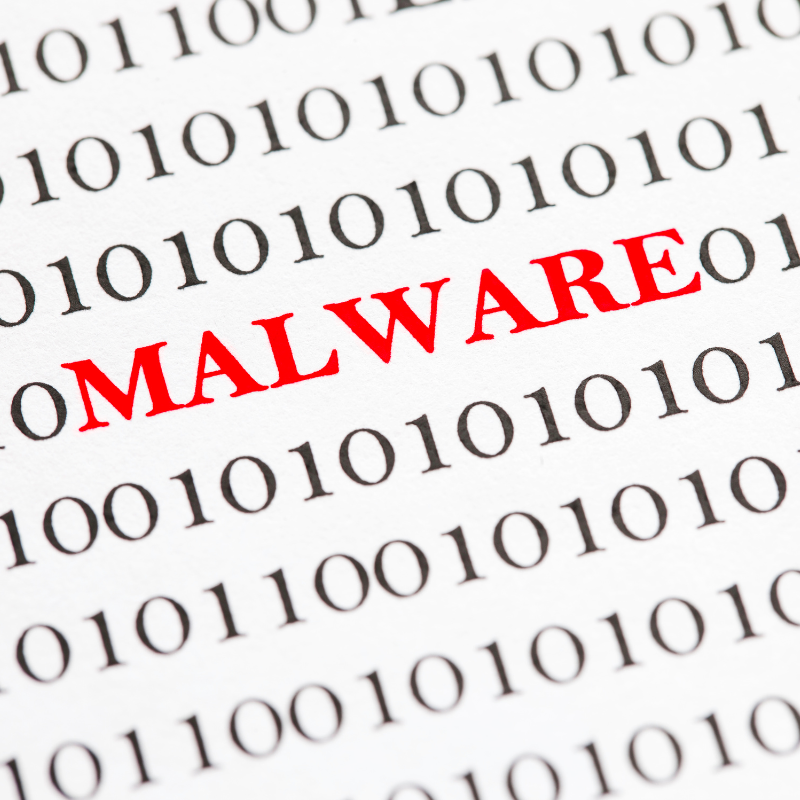 The word malware is in red lettering amidst a grid of ones and zeros to imply hidden danger.