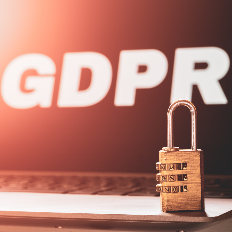 A laptop with GDPR written on it and a padlock on the keyboard.