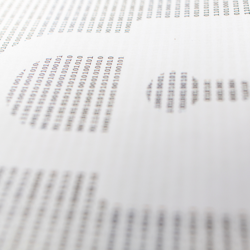 A page filled with 1s and 0s is interrupted by the shape of a padlock.