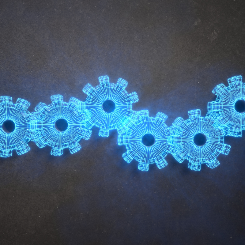 Blue, digital cogs are interconnected in a row across the image.