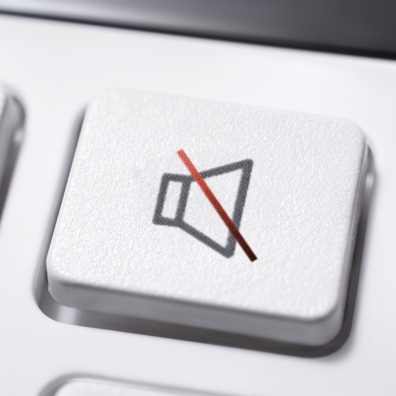 A keyboard focused on the "mute sound" key.