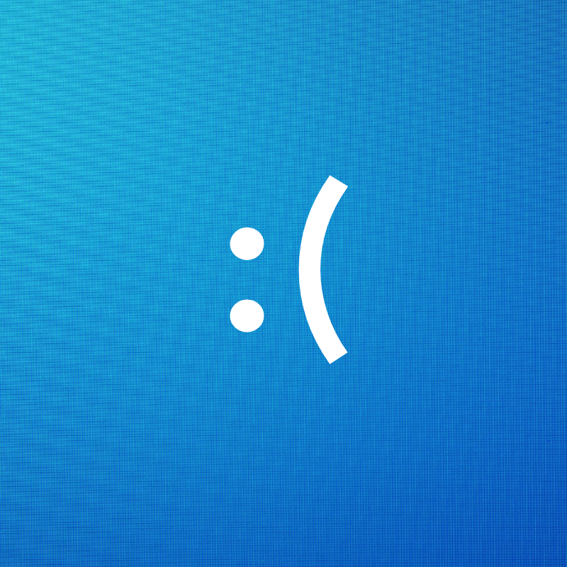 A white frowny face emoticon against a blue screen to resemble a Microsoft error.