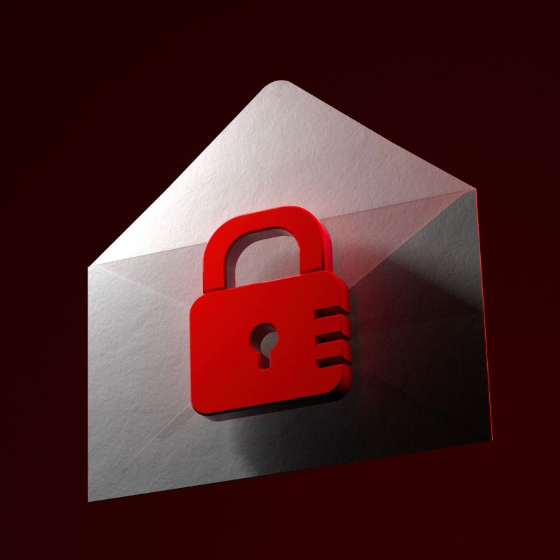A red padlock sits in front of a white envelope.
