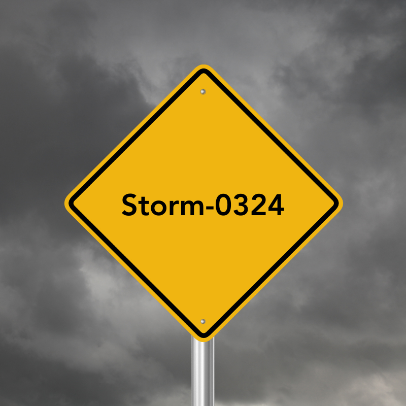 Caution sign with the words "Storm-0324" and a stormy sky in the background