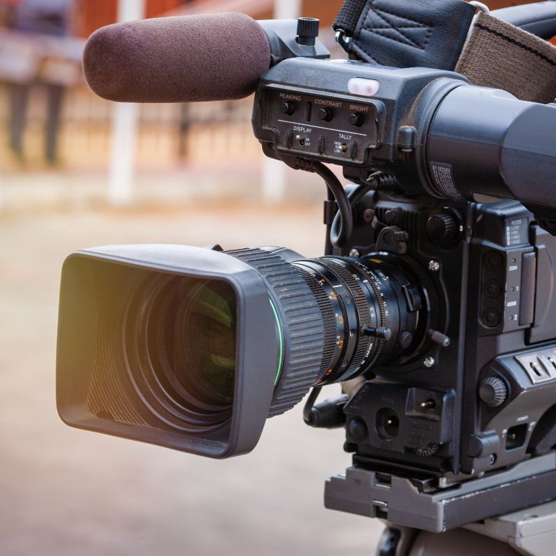 A close-up of a studio broadcast camera.
