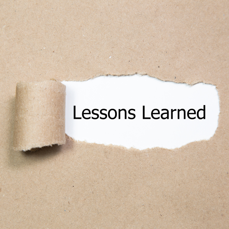 A torn piece of paper reveals the words "Lessons learned"