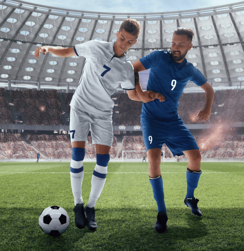 Two soccer players in a stadium fighting over the ball